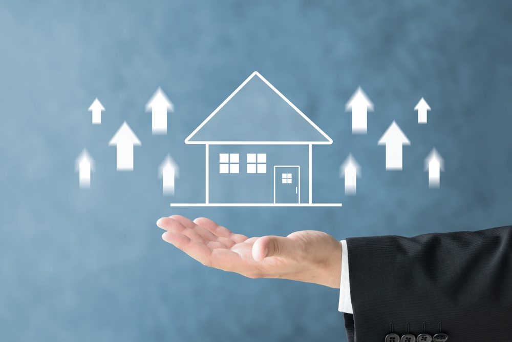 Businessman's,Hand,And,House,Illustration,With,Upward,Arrows